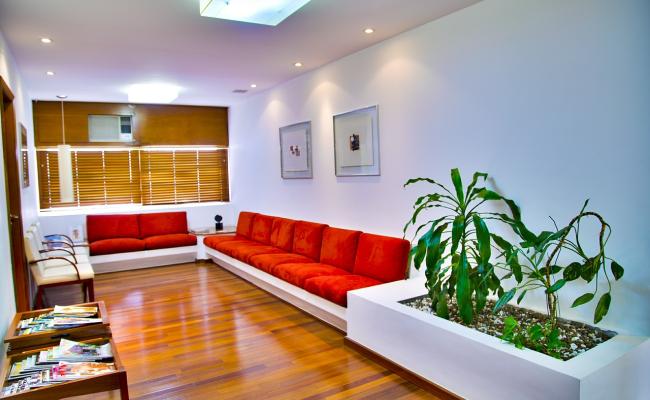 The inside of a doctor's office waiting room is shown.